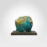 Golden Radiance: Light Blue and Gold Face Sculpture